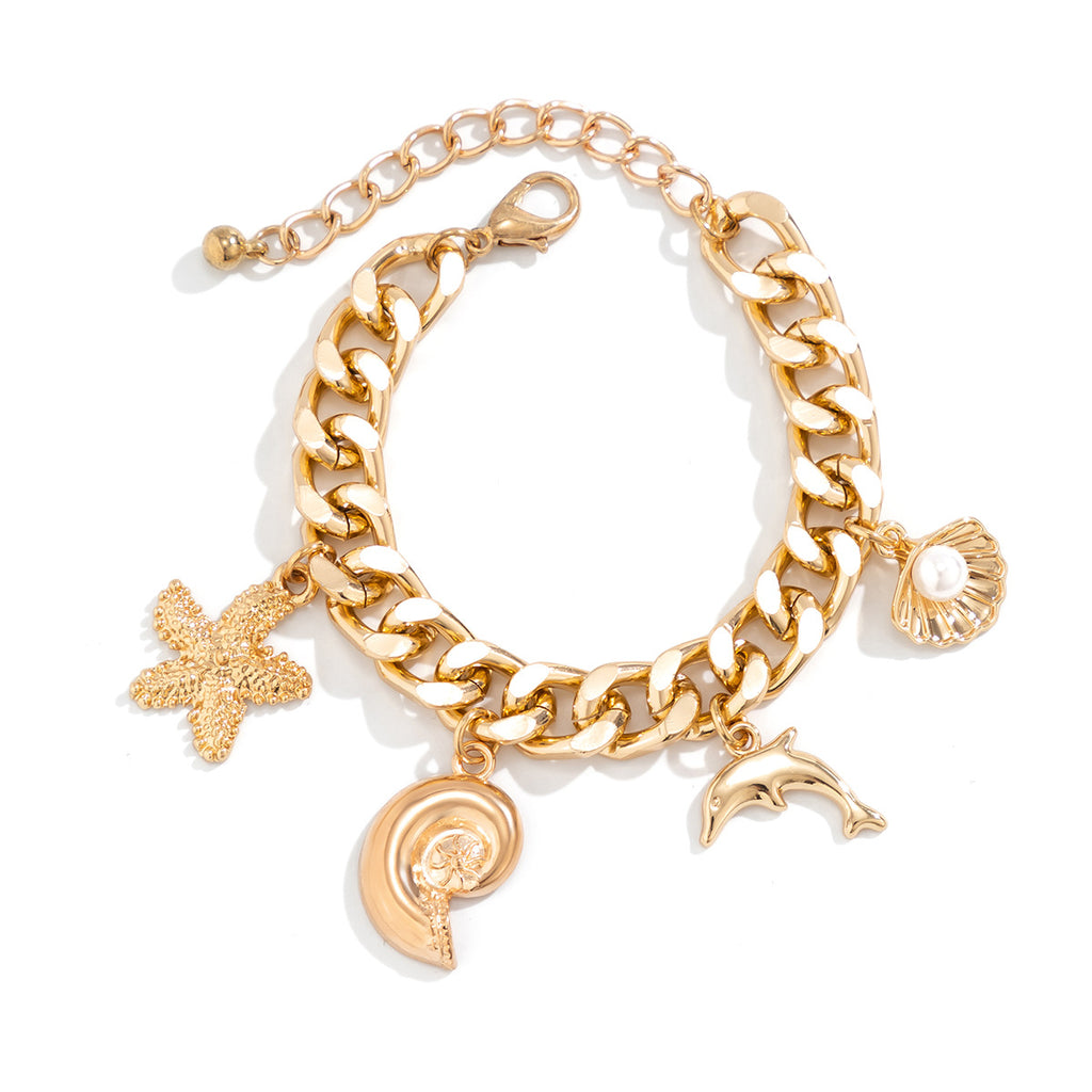 Colier et bracelet doré de symbol plage