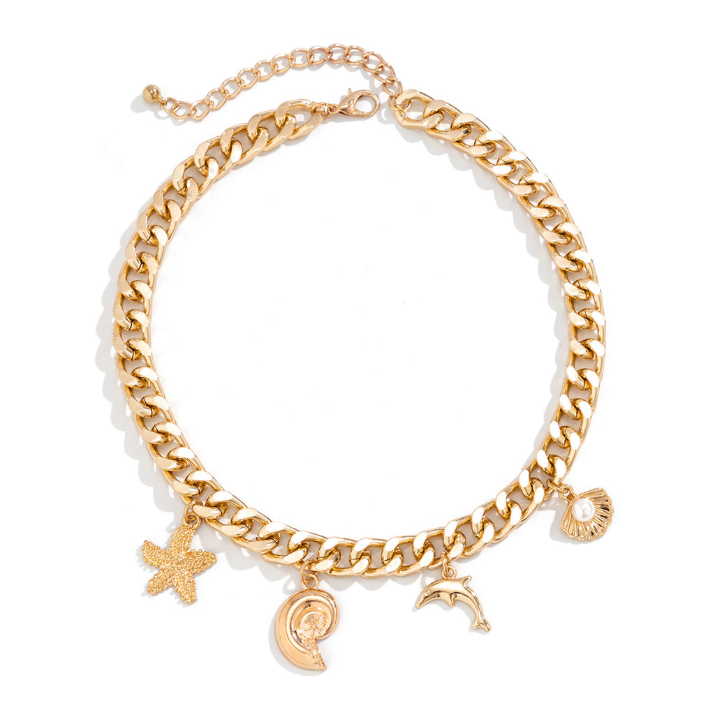 Colier et bracelet doré de symbol plage